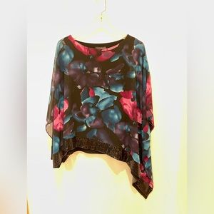 Flower printed top with sequins trim on bottom
